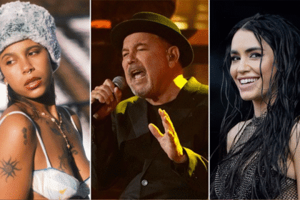 Artistas de música latina en un escenario iluminado representando la innovación de 2025