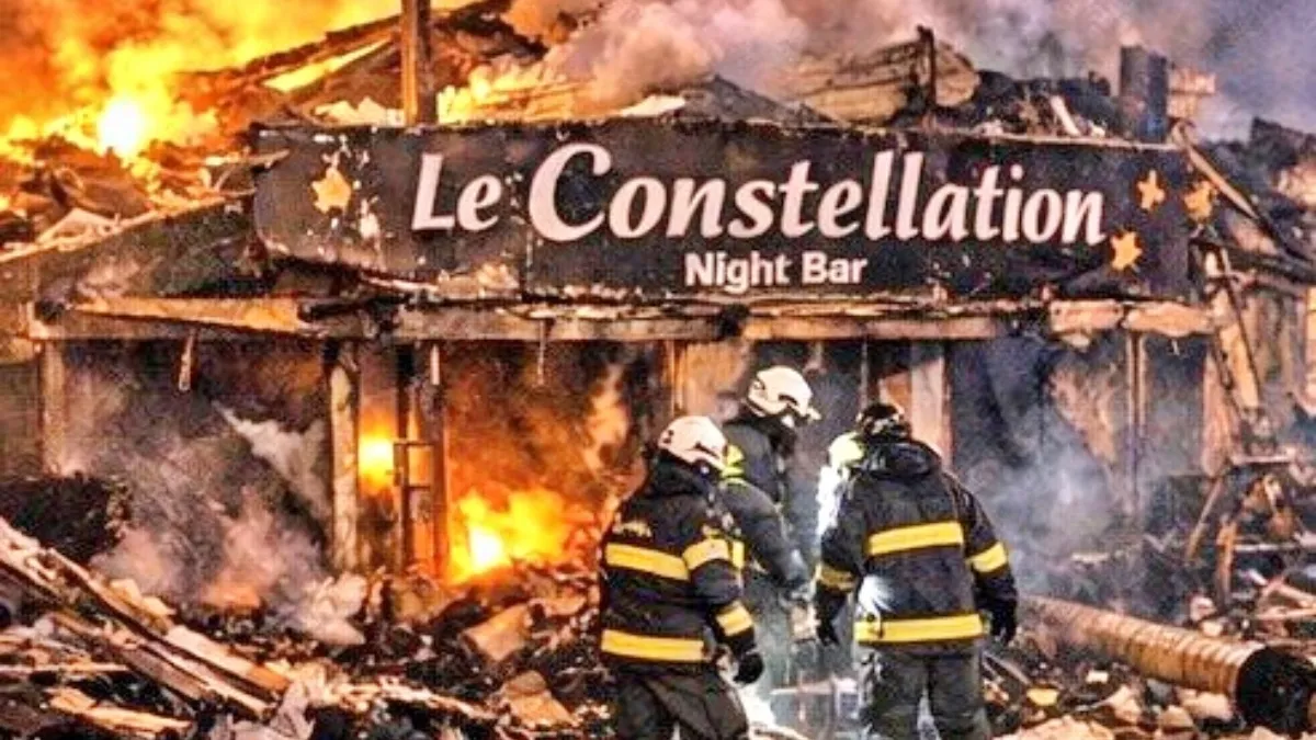 Bomberos y equipos de rescate trabajan frente a un bar incendiado en Crans-Montana de noche