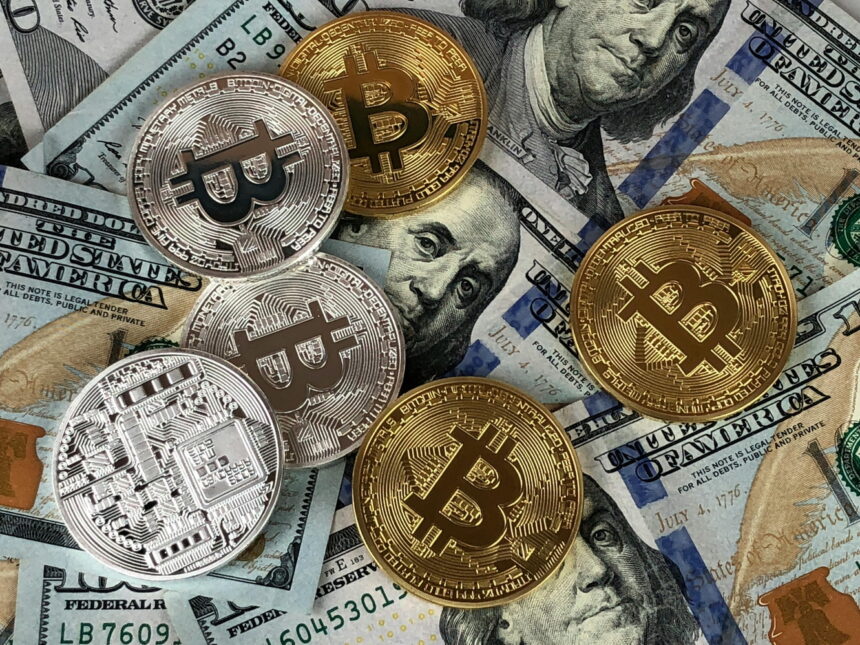 Moneda digital de Ethereum sobre un fondo con la Reserva Federal de Estados Unidos difuminada.